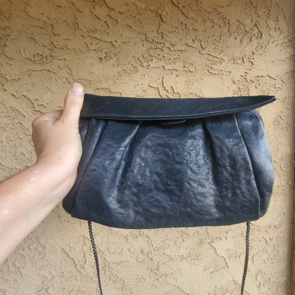 Misako Leather Fold Magnetic Closure Detachable Braided Stap Crossbody Clutch.